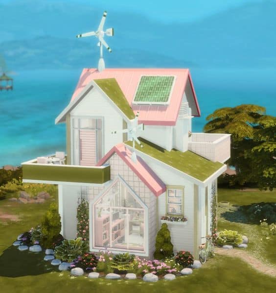 Preview image of the Tiny Eco Barbie Home by miraloulou. It's a cute white house with pink roof pieces, a little green and a pretty designed front garden.